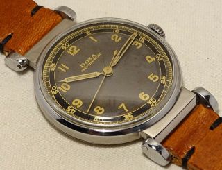 V.  Rare military 35 mm Vintage Doxa Antimagnetic with two tone dial 7