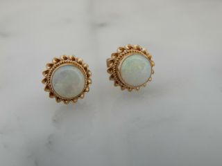 A Stunning 9 Ct Gold Decorative Opal Earrings