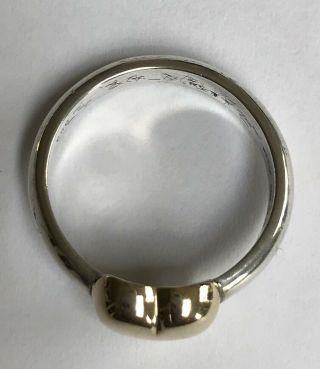 VINTAGE STERLING SILVER BAND RING SET WITH 14ct (585) GOLD HEART.  SIZE P 3