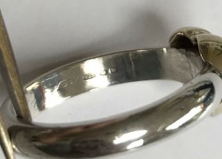 VINTAGE STERLING SILVER BAND RING SET WITH 14ct (585) GOLD HEART.  SIZE P 4