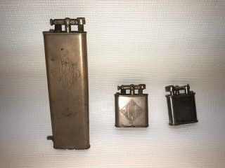 Vintage Dunhill Lift Arm Cigarette Lighters (2 Units) And One Unknown Lighter