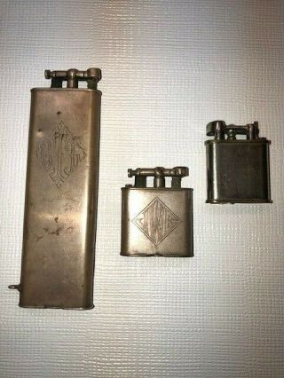 Vintage DUNHILL Lift Arm Cigarette Lighters (2 units) and one unknown lighter 2
