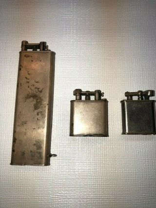 Vintage DUNHILL Lift Arm Cigarette Lighters (2 units) and one unknown lighter 3