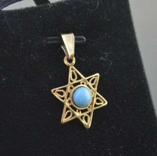 Cw20 - 14k Yellow Gold Star Of David With A Turquoise In The Center Charm Pendant