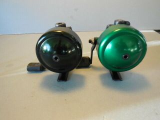 2 JOHNSON CENTURY CASTING REELS 40TH AND 45TH ANNIVERSARY REELS - BOTH MINTY 2