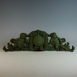 Vintage Cast Iron Overdoor Pediment With Putti And Shield