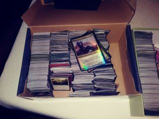 Roughly 10,  000 Magic cards,  over 750 rares 3