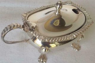 A Solid Sterling Silver Mustard Pot With Glass Liner Birmingham 1983.