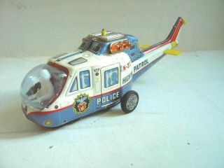 Old Japan T.  P.  S.  Tin Batt.  Op.  Police Helicopter