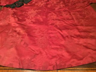 An Chinese Qing Dynasty Embroidered Red Ground Silk Robe. 5