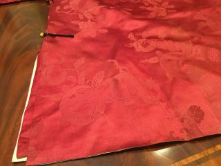 An Chinese Qing Dynasty Embroidered Red Ground Silk Robe. 6