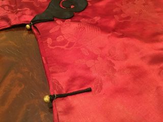 An Chinese Qing Dynasty Embroidered Red Ground Silk Robe. 7