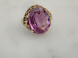 A Fabulous 9 Ct Gold 12.  00 Carat Oval Amethyst Ring