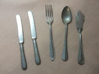 Childs Flatware 2 Knives.  1 Spoon.  1fork & 1 Butter Knife Marked Germany
