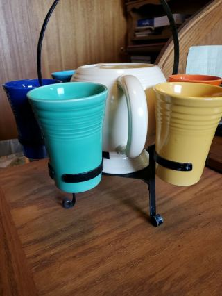 Fiestaware Vintage 10 Oz Tumblers With Pitcher And Caddy.  All Colors