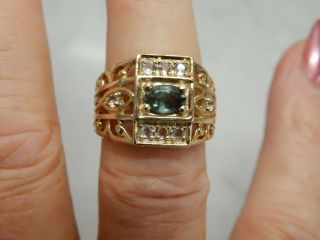A Stunning 9 Ct Gold Decorative Oval Green Diopside And Topaz Ring