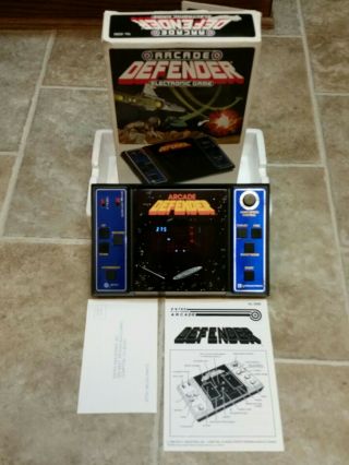 Vintage Entex Defender Electronic Handheld Arcade Game.  Good.