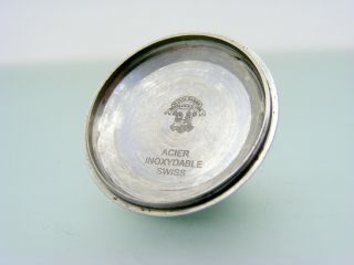 Vintage big 40 mm.  Ulysse Nardin Steel square case black dial,  automatic,  day date 11