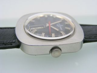 Vintage big 40 mm.  Ulysse Nardin Steel square case black dial,  automatic,  day date 7