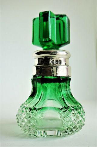 silver banded,  London 1905,  green cut glass perfume bottle.  height 70mm 2