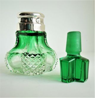 silver banded,  London 1905,  green cut glass perfume bottle.  height 70mm 6