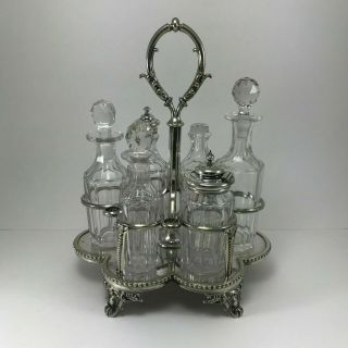Silver Plated Cruet Set With (6) Crystal Condiment Bottles Set