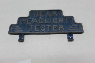Vintage Bear Headlight Tester Cast Metal Sign Plaque W/ Sticker Lc - 2050
