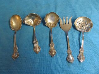Sterling Set Of 5 Small Serving Spoons Pat.  Jan 21,  99