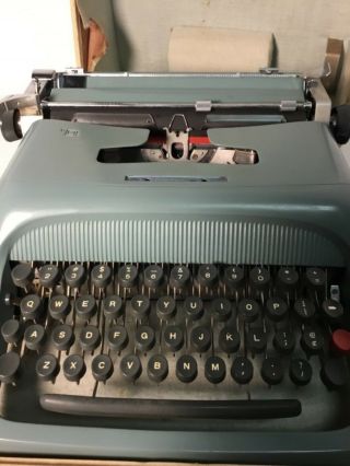 Vintage Blue Olivetti Underwood Studio 44 typewriter with case 2