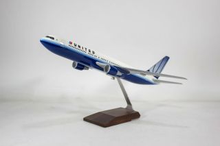Pacmin 1/100 Boeing 767 - 300 United In Vintage Blue Tulip Livery Desktop Model