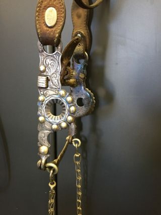 Vintage silver spade bit with headstall,  reins and romel and rein chains. 3