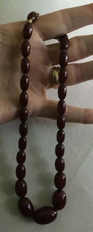 Art Deco Faturan Cherry Amber Bakelite Beads.