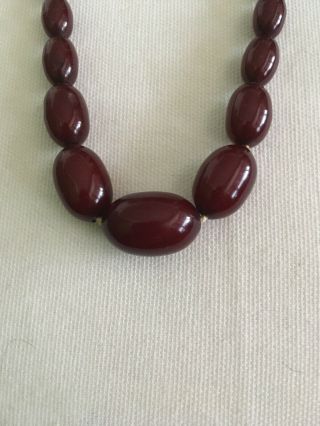 Art Deco Faturan Cherry Amber Bakelite Beads. 4