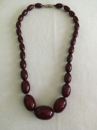 Art Deco Faturan Cherry Amber Bakelite Beads. 5