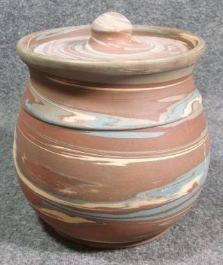 VINTAGE NILOAK MISSION SWIRL COVERED JAR WITH TAG 6 IN ROUND 5 IN TALL 4