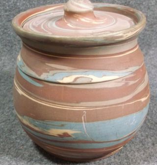 VINTAGE NILOAK MISSION SWIRL COVERED JAR WITH TAG 6 IN ROUND 5 IN TALL 5