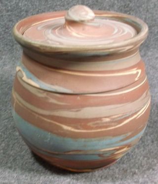VINTAGE NILOAK MISSION SWIRL COVERED JAR WITH TAG 6 IN ROUND 5 IN TALL 6