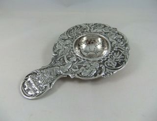 Continental Sterling Silver Tea Strainer With Cherubs & Muse,  1913
