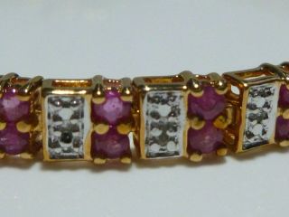 STERLING SILVER 18K GOLD OVERLAY RUBY WOMENS TENNIS BRACELET 7.  25 