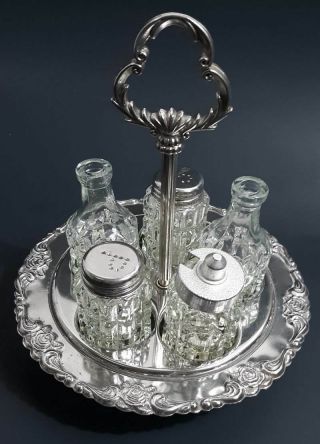 Antique Silverplate Cruet Set Rotating Carousel Caddy Crystal Etched Glass
