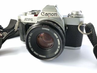 Vintage Canon Av - 1 Film Camera And Bag With 2 Canon Lenses - 50mm And 135mm