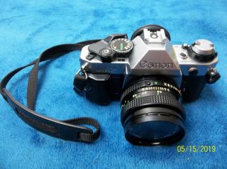 Vintage Canon AE - 1 Program 35mm SLR Camera with 50mm 1:1.  8 Lens 4