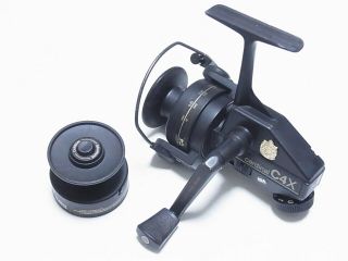 Abu Garcia Cardinal C4x Rear Drag Spinning Reel Very Good W/spare Spool