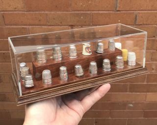 A Well Made Thimble Display Case,  12 Antique Solid Silver Thimbles.