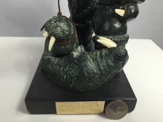 VINTAGE CARVED STONE ESKIMO ART MAN WITH WALRUSES SCULPTURE FIGURE STATUE 4