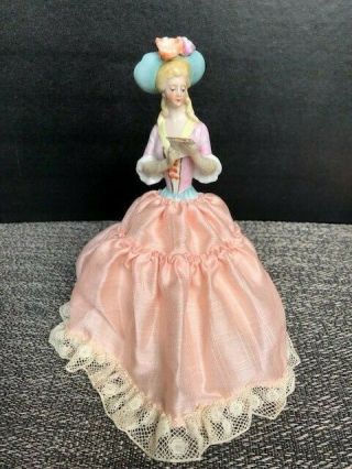 ANTIQUE GERMANY PORCELAIN HALF DOLL WITH HAT AND EXTENDED ARMS HOLDING PAPER 2