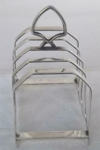 A LARGE & HEAVY SOLID SILVER FOUR SLICE TOAST RACK SHEFFIELD 1931 109 grams. 5