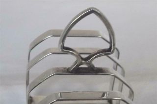 A LARGE & HEAVY SOLID SILVER FOUR SLICE TOAST RACK SHEFFIELD 1931 109 grams. 6