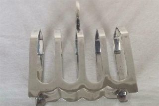 A LARGE & HEAVY SOLID SILVER FOUR SLICE TOAST RACK SHEFFIELD 1931 109 grams. 8