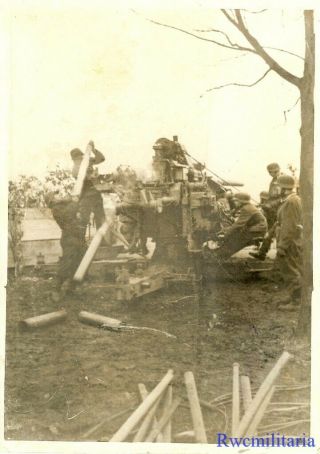Press Photo: Action German Troops Firing 10.  5cm Flak Gun At Ground Targets